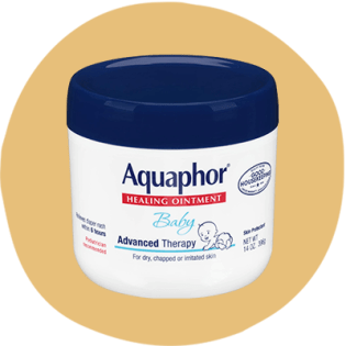 A tub of aquaphor baby healing ointment on a yellow background.